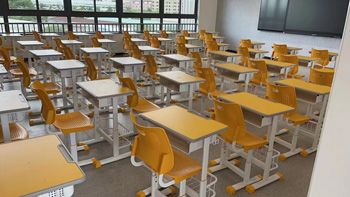 Height adjustable school desk and chair